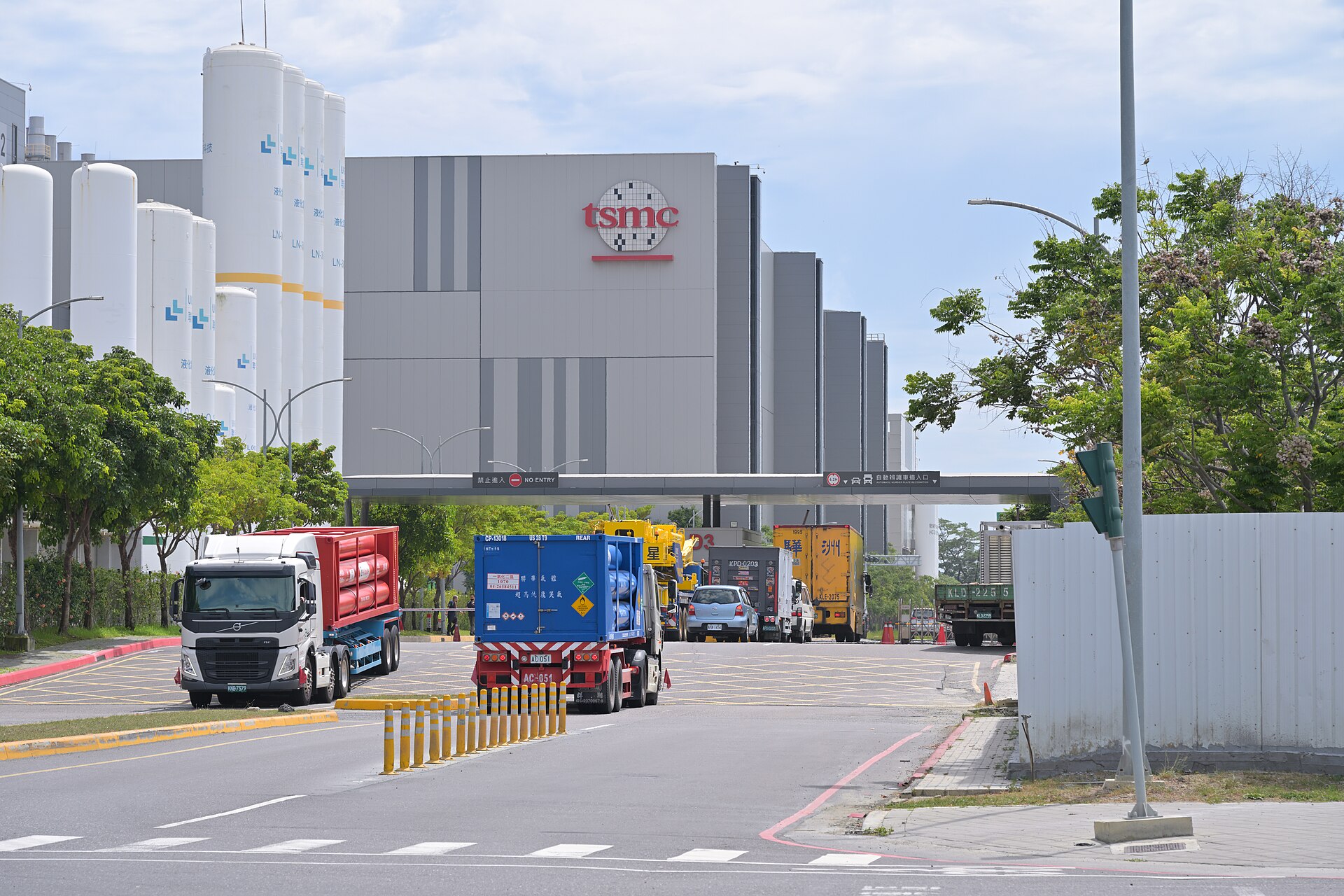 Trucks entering and leaving TSMC Fab 18 May 2025